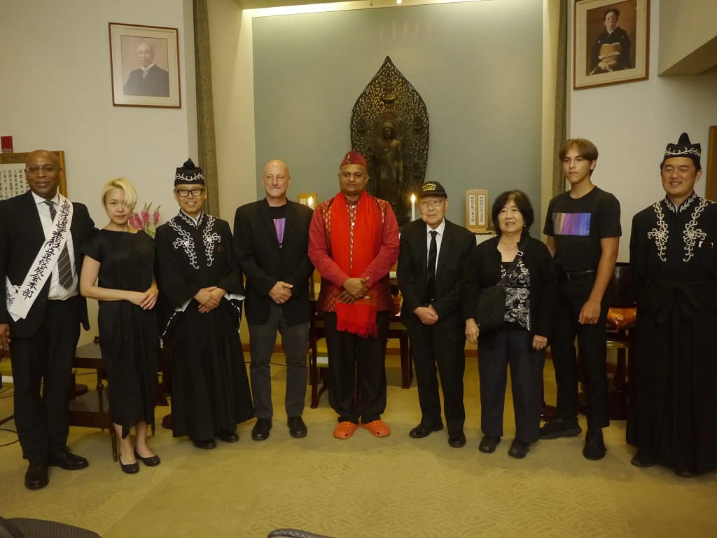 80th anniversary of Hiroshima remembrance. Group image. Tak Furumoto, Rev James Lynch, Rino Aise. Location: Rissho Kosei-kai Buddhist in New York City, Micheal Muge, Mr. Fukui of the Tenri Cultural Institute. Yoshiko Nakamura
